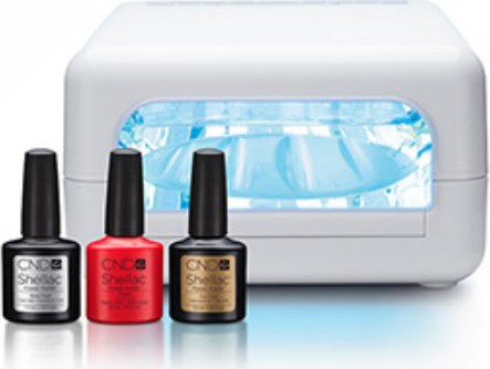 UV-Lampe mit drei Shellac-Lackflaschen